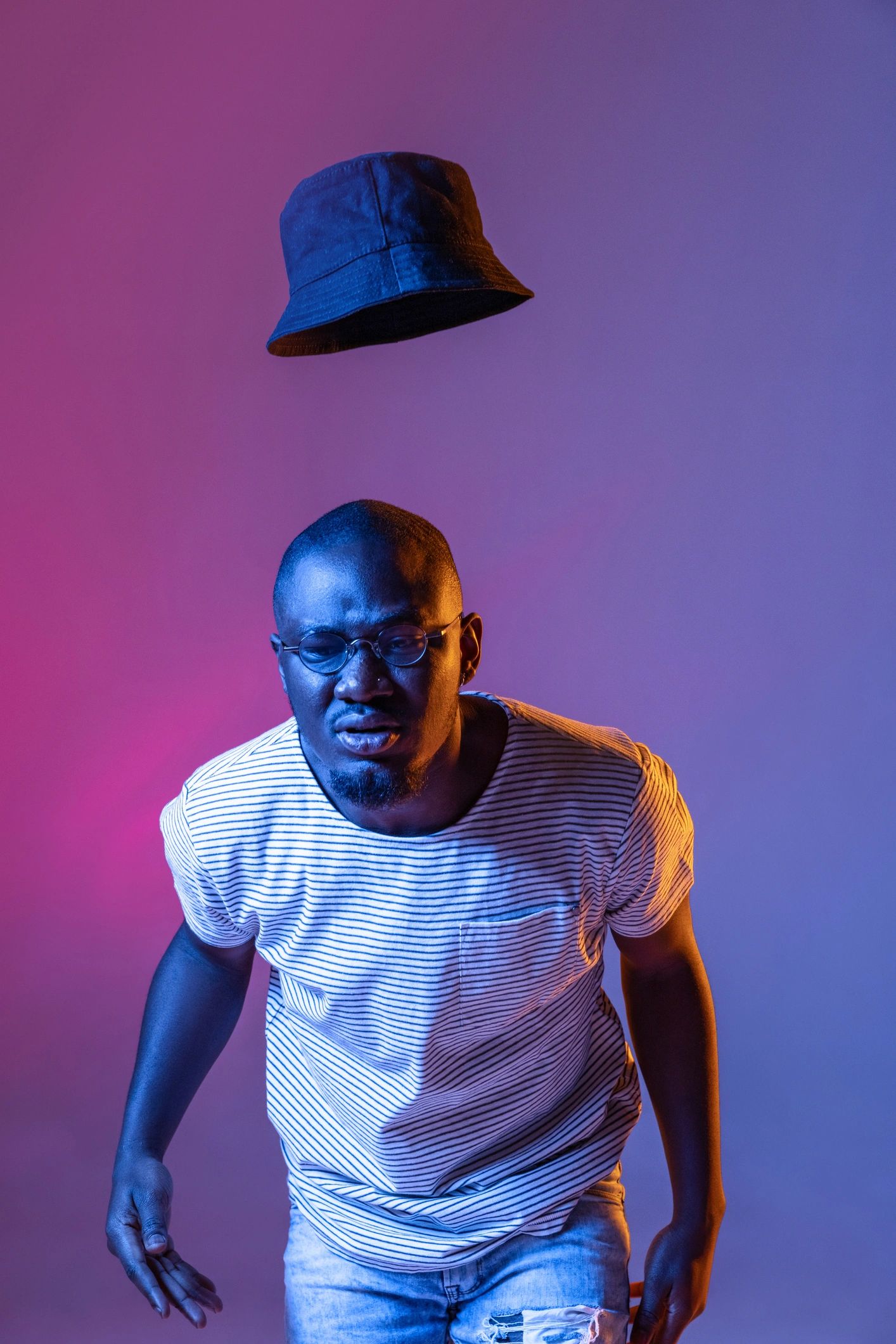 Portrait of a creator in neon studio lighting