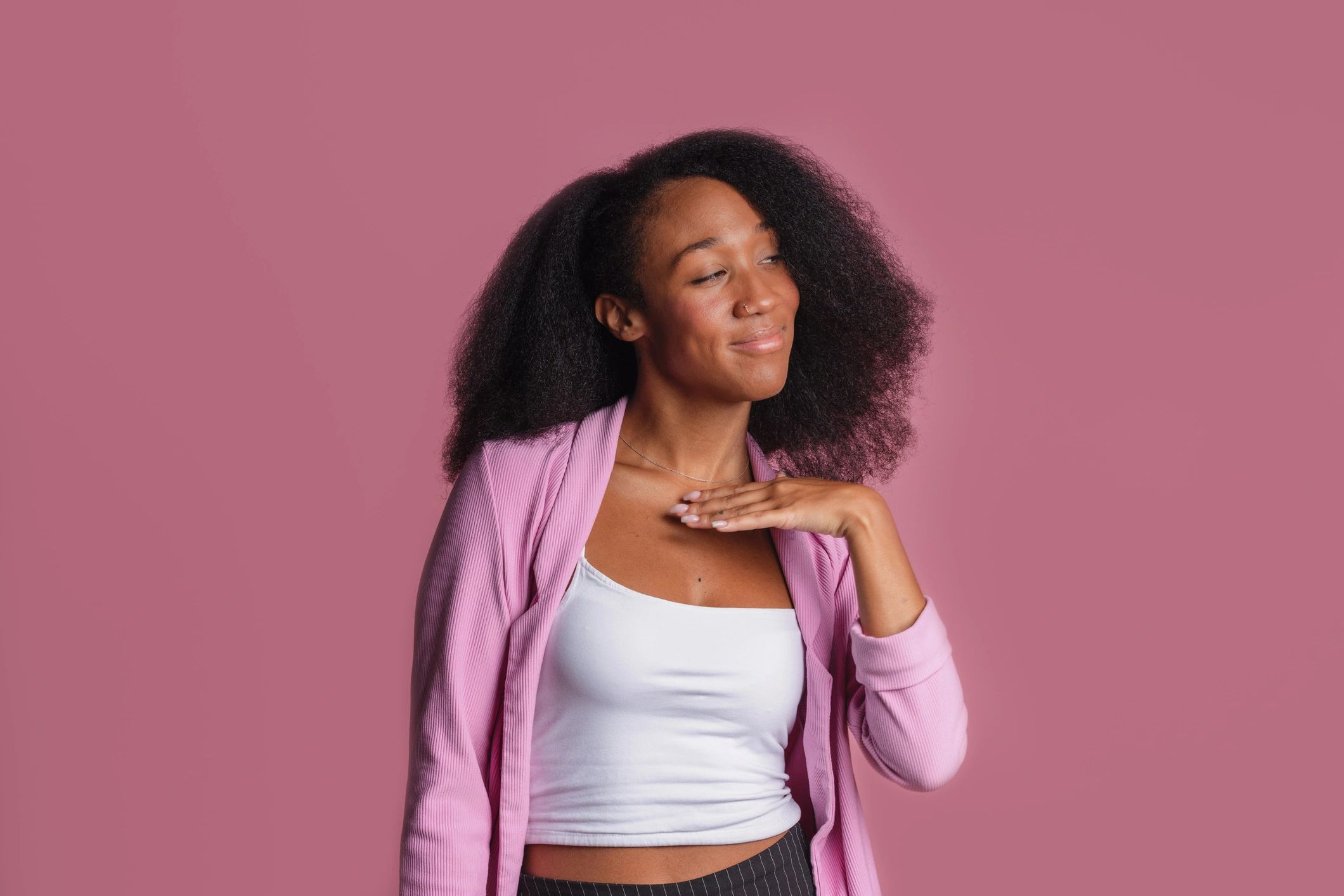 Confident African-American Woman in Pink Blazer