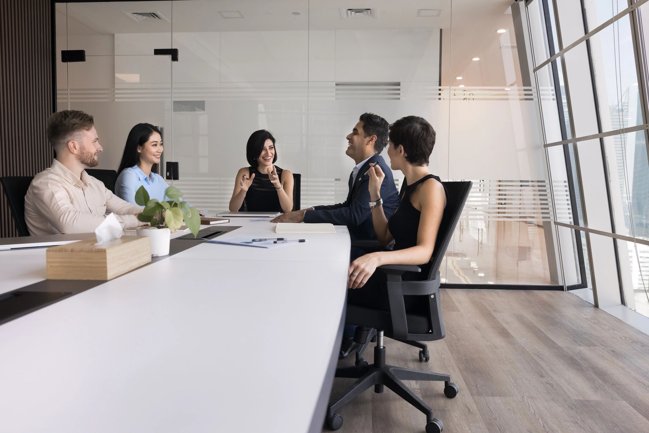 Stakeholders collaborating around a conference table