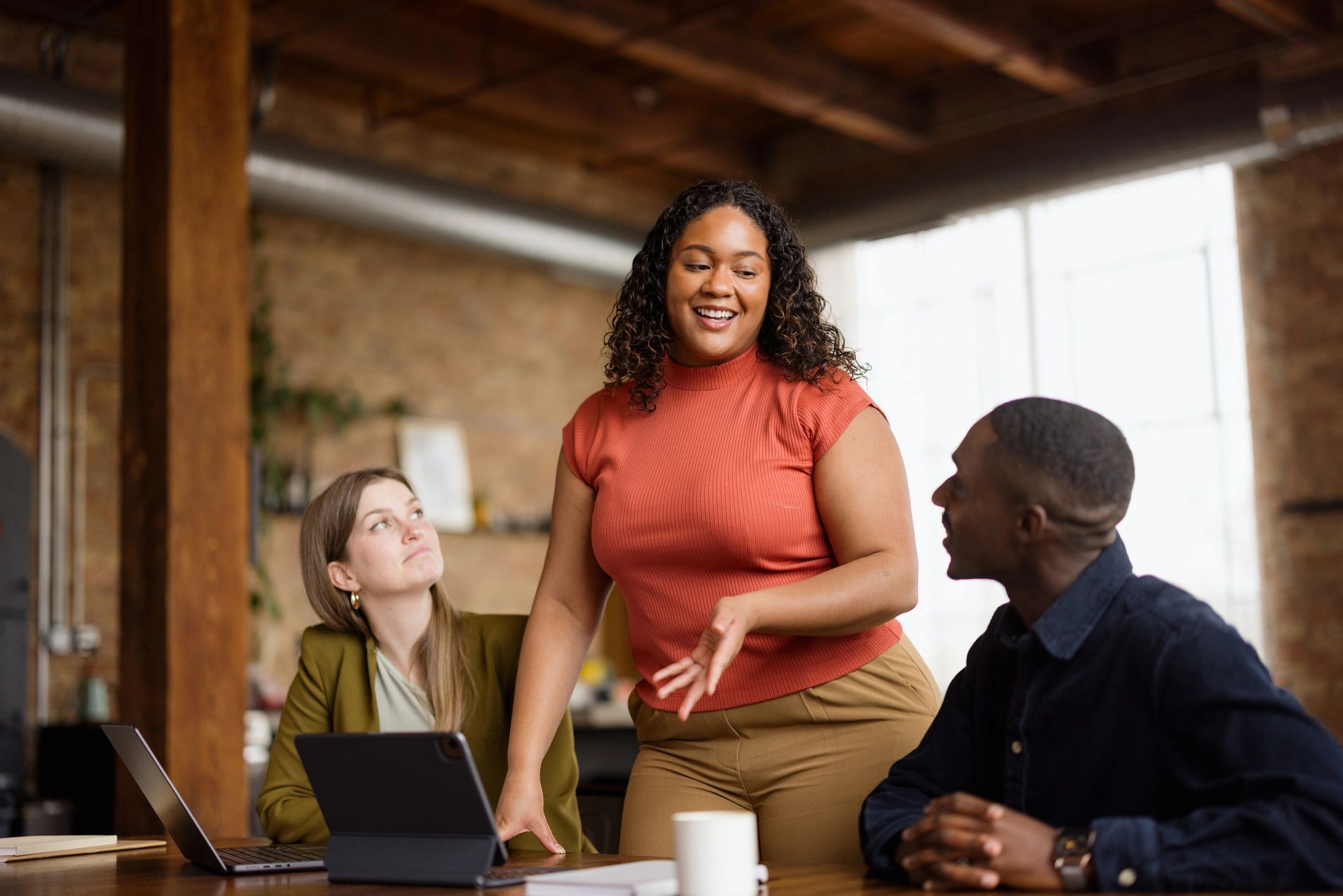 Creative professional in discussion during campaign planning