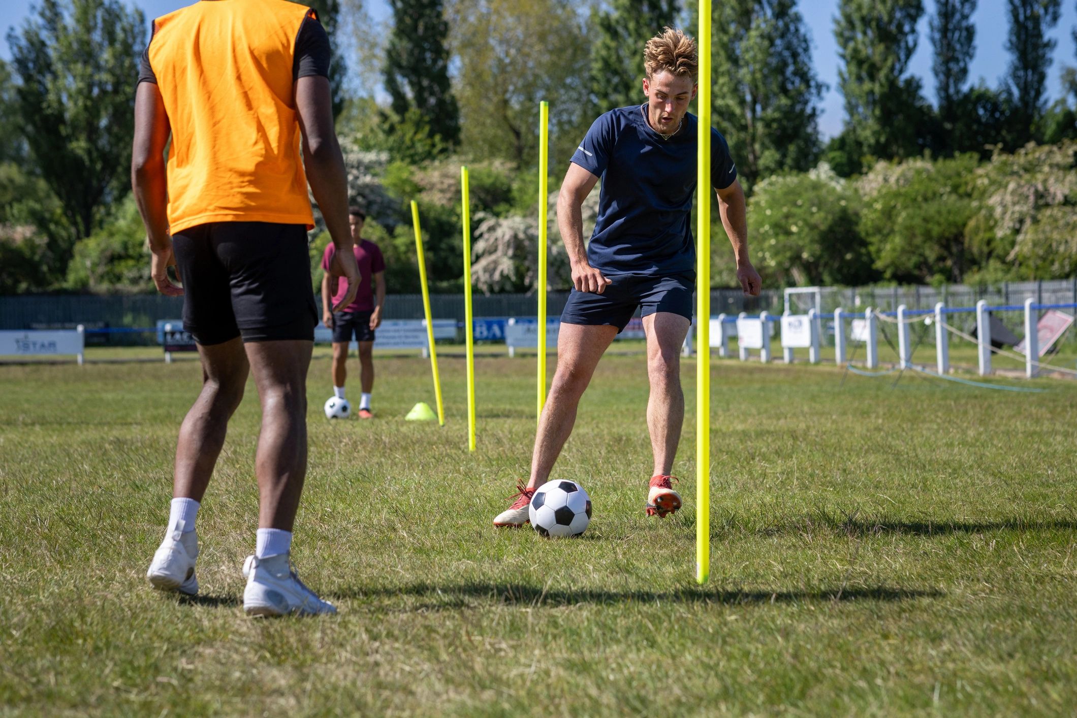 Athletes training on a football field