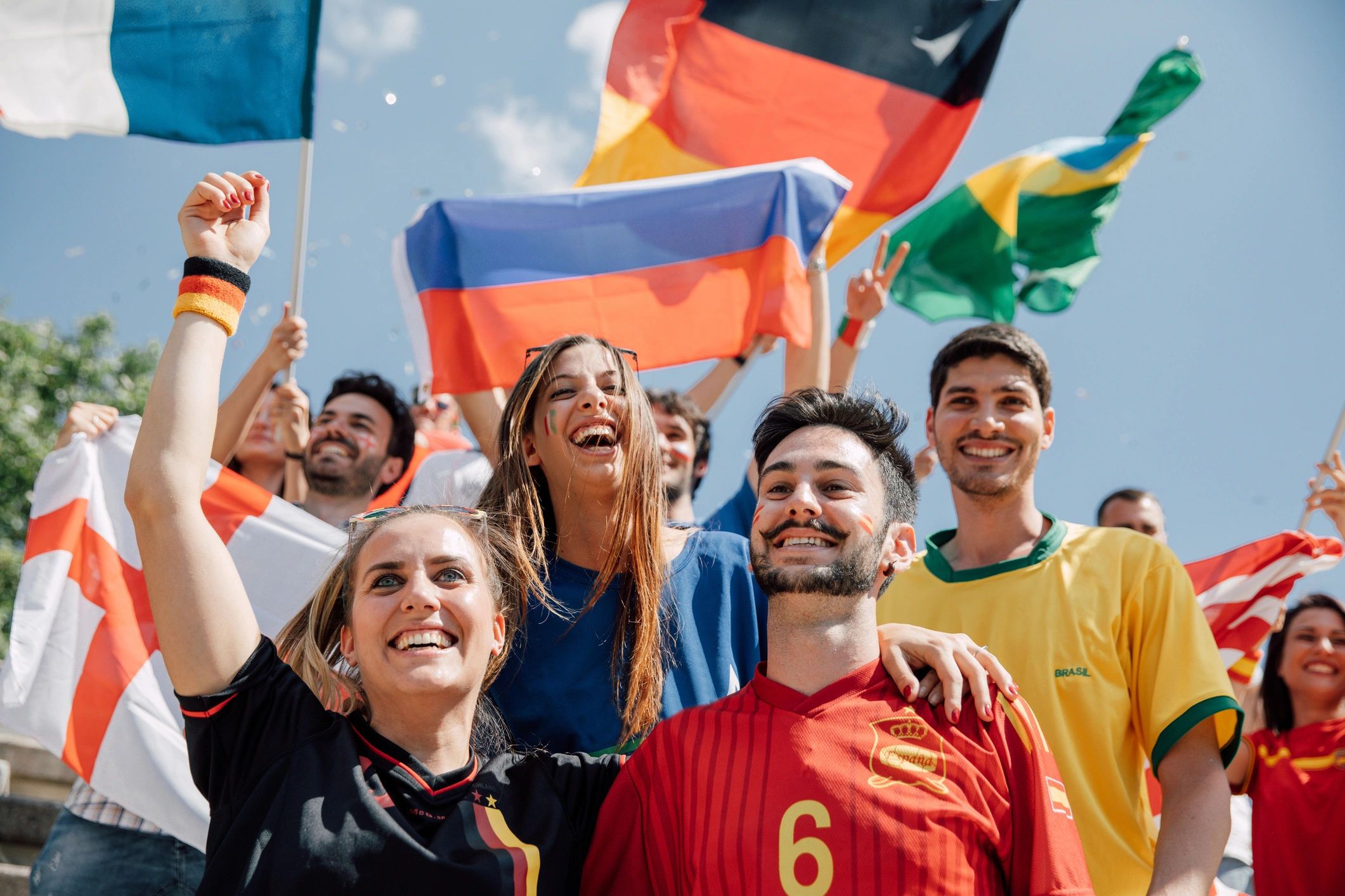 International sports supporters representing global brand partnership reach